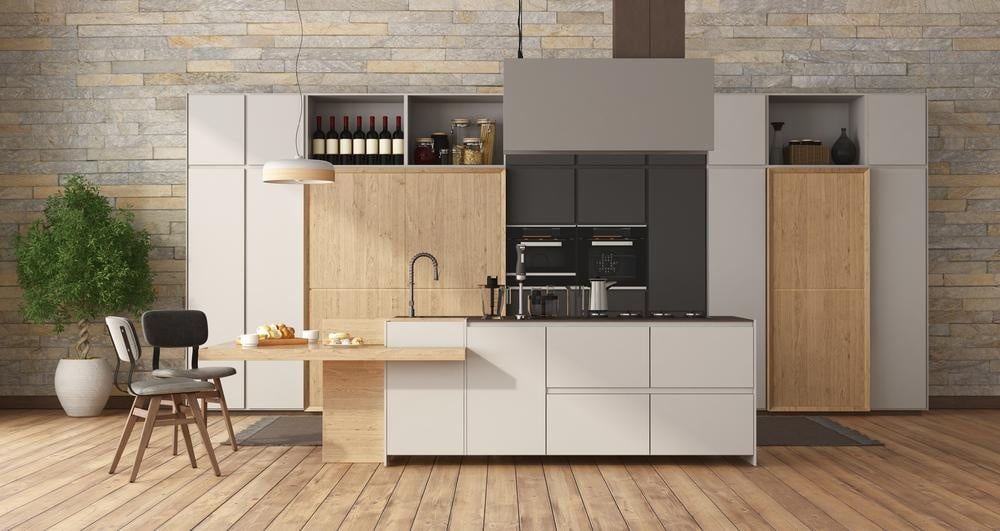 handleless kitchen cabinets and drawers in a kitchen with wooden floor and white island