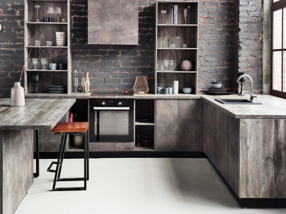 modern wooden kitchen design with grey counter cabinets and a stool