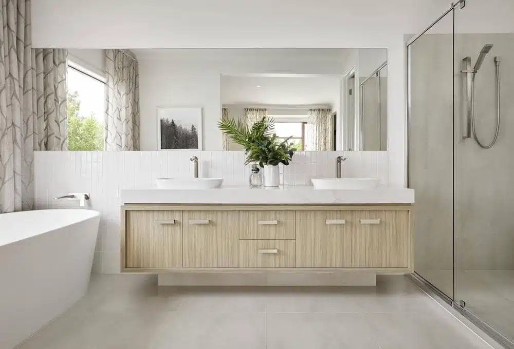 white modern bathroom with classic vanity and a tub next to it