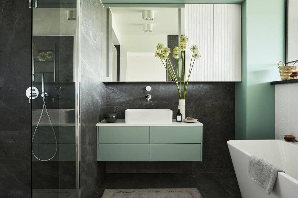 modern bathroom green vanity with hot tub