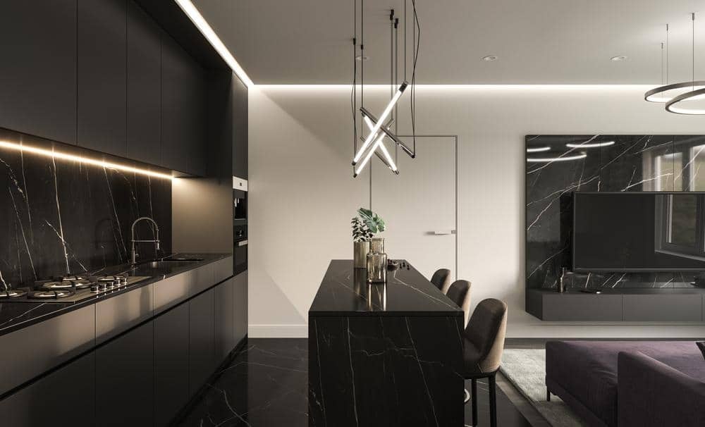 black cabinet and island kitchen with led lights on the ceiling