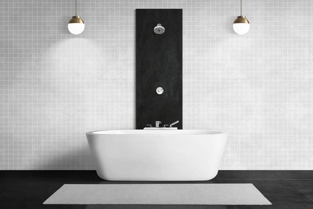 a bath tub in a bathroom with spotlight and black floor