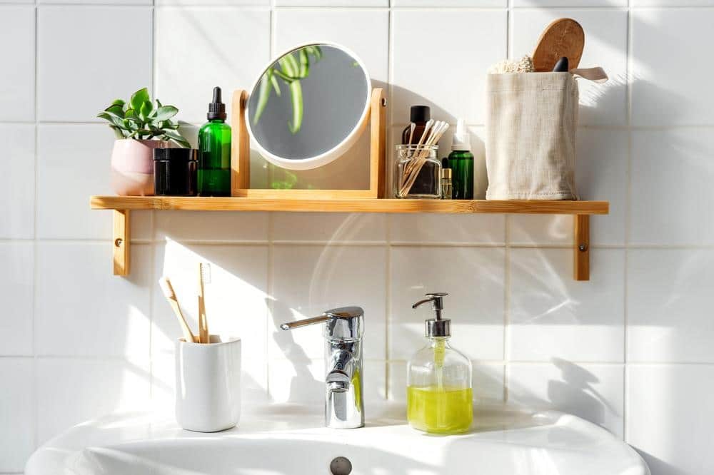 wooden wall hung shelf above the white sink