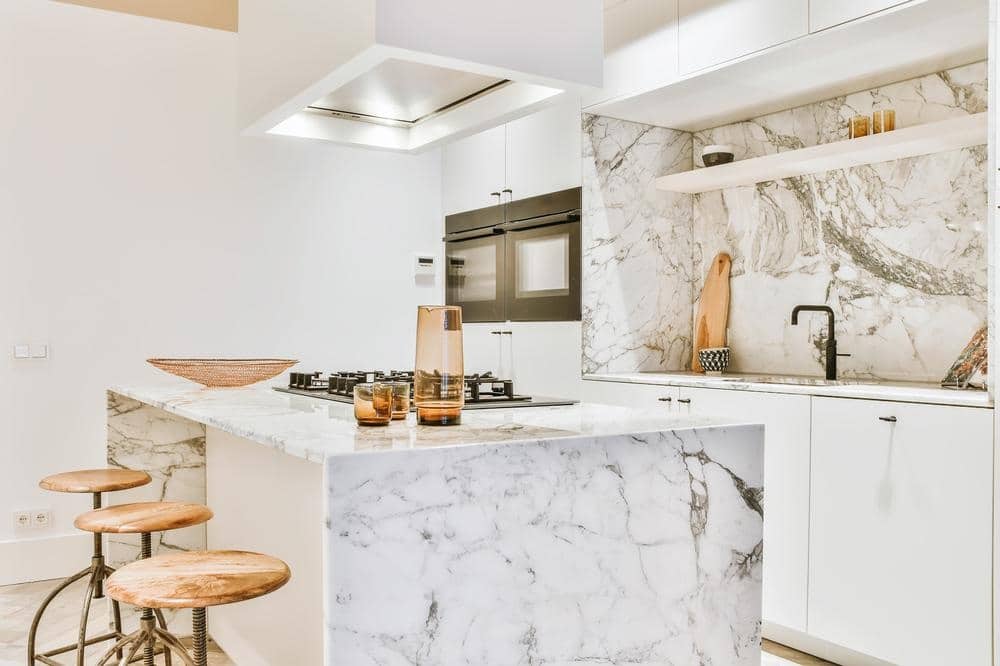 white marble kitchen island in a modern kitchen