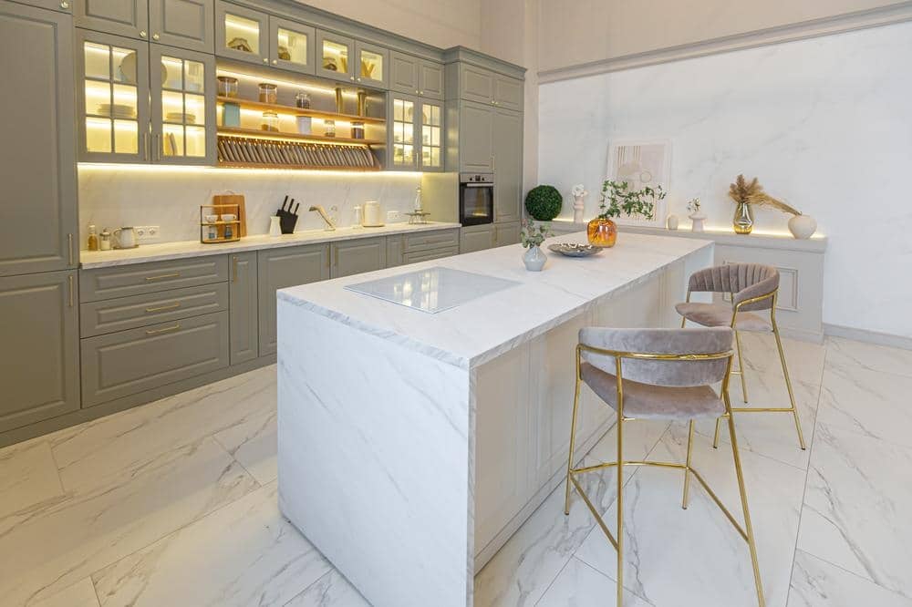 white quartz kitchen island in a white kitchen