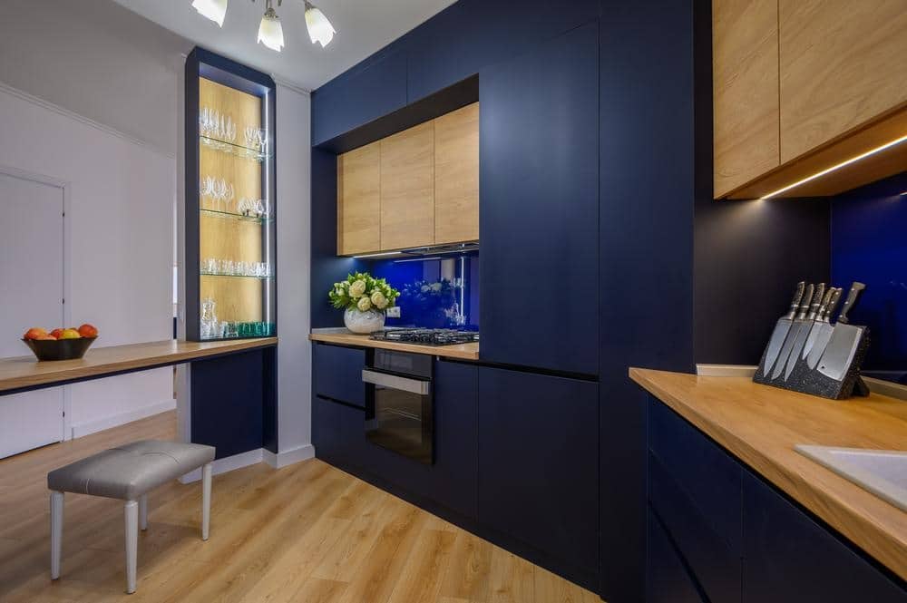 stylish blue colored studio studio apartment with kitchen open living room | 12 Fresh Blue Kitchen Cabinets Ideas - Reviving Your Kitchen Space